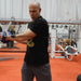 Ab Ball Core Training System With A Man Performing Standing Rotation