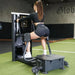 Abs Company Glute Zone Training System With A Woman Performing A Standing Hip Abduction Exercise On Gym Setting