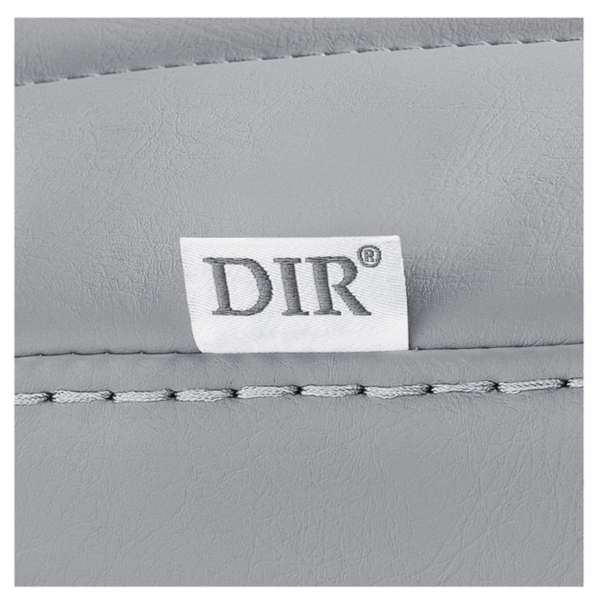 Artura Modern Barber Chair Close-Up View Of Gray Upholstery With Horizontal Stitching And Brand Name