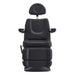 Aurora 4-Motors Swivel Medical Procedure Chair Black Front View Showing Pulled-up Headrest On White Background