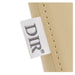 Bella V Recline Massage Shampoo Unit Close-Up View Of Beige Upholstery With Brand Name