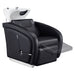 DIR Anode Salon Shampoo Chairs with Adjustable Leg Black Front Angled View With White Single Sink Station With Blurred Leg Rest Demonstration