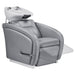 DIR Anode Salon Shampoo Chairs with Adjustable Leg Gray Front Angled View With White Single Sink And Blurred Leg Rest Demonstration