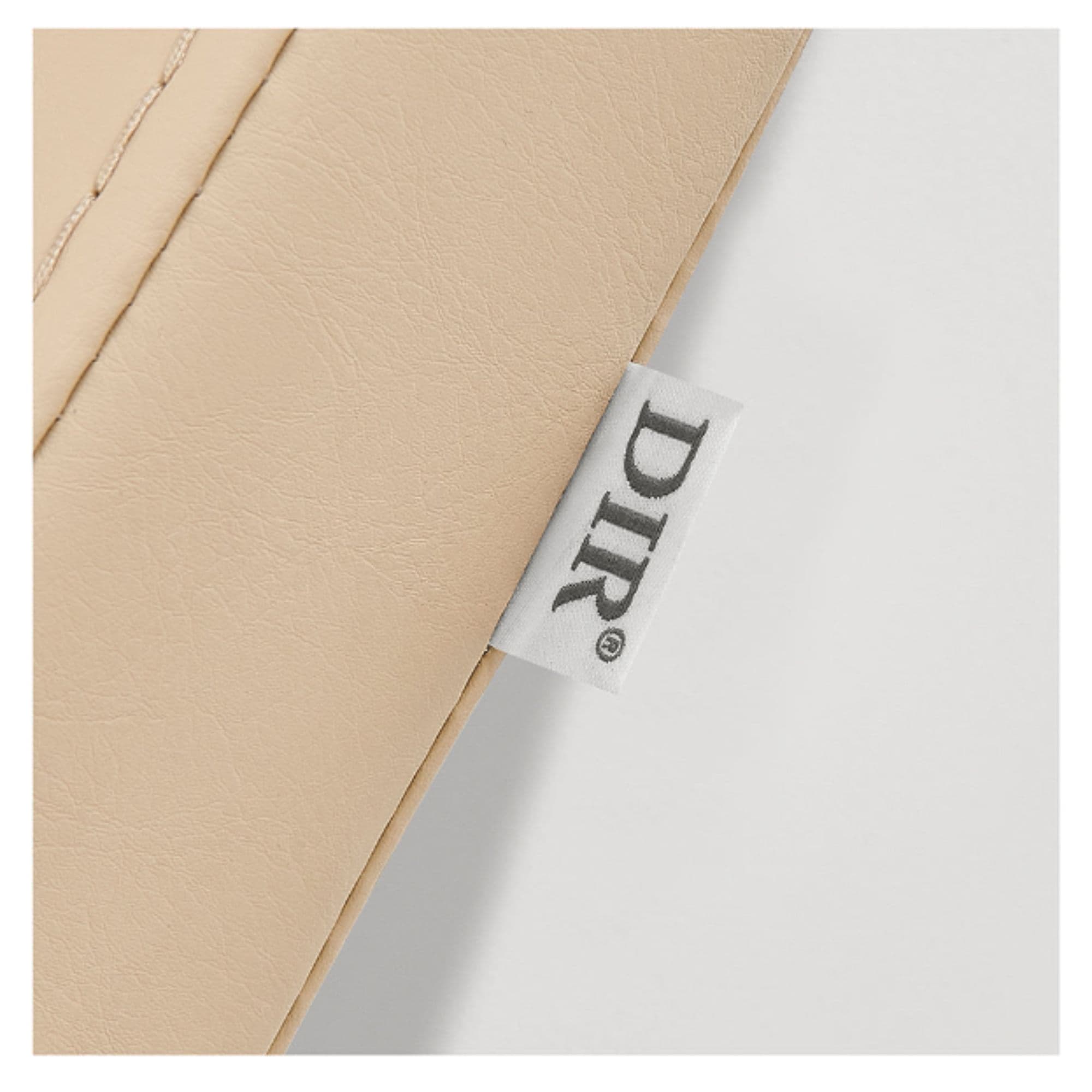 DIR Beckman Adjustable Salon Shampoo Unit Close-Up View Of Beige Upholstery With Brand Name