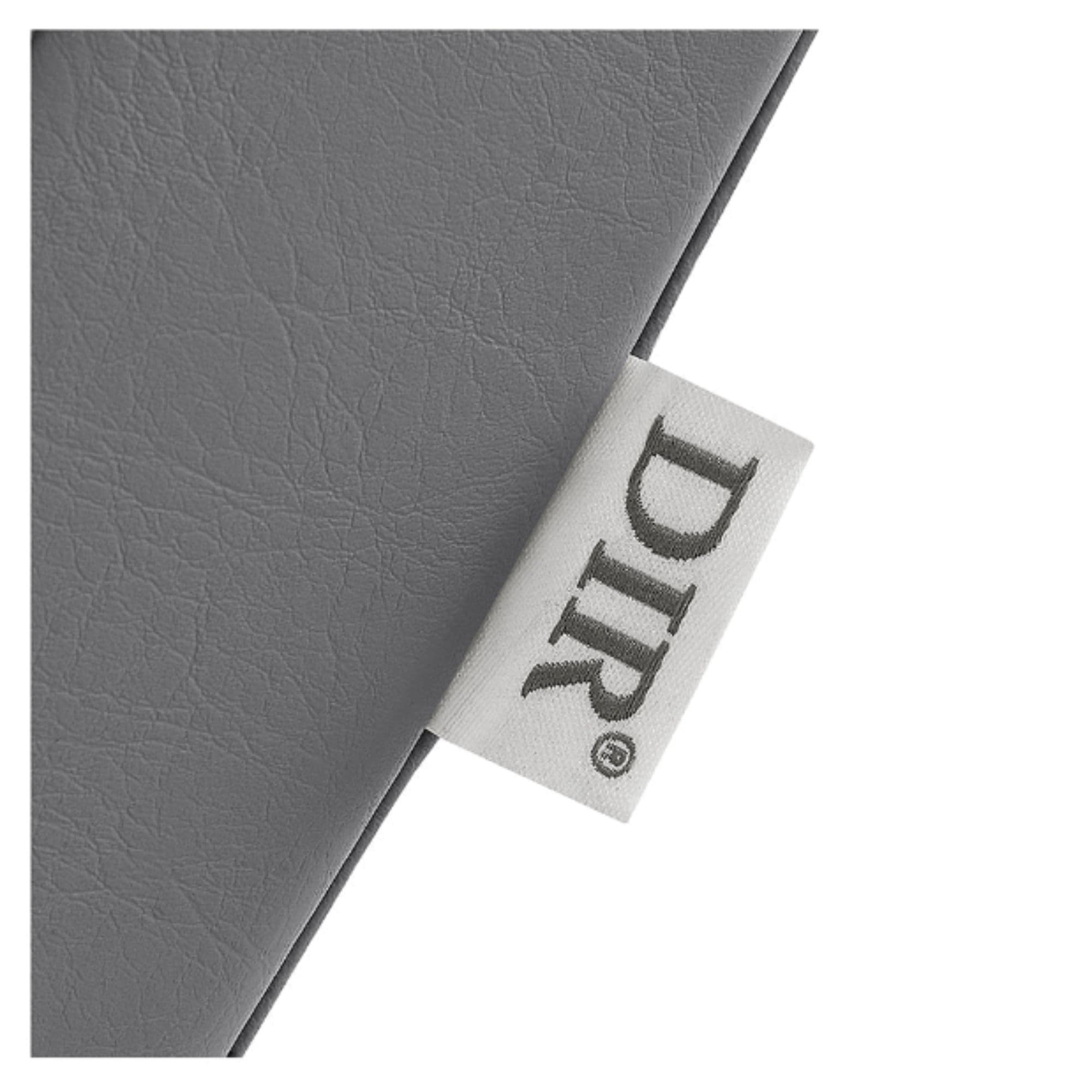DIR Beckman Salon Shampoo Unit with Adjustable Seat Close-Up View Of Gray Upholstery With Brand Name
