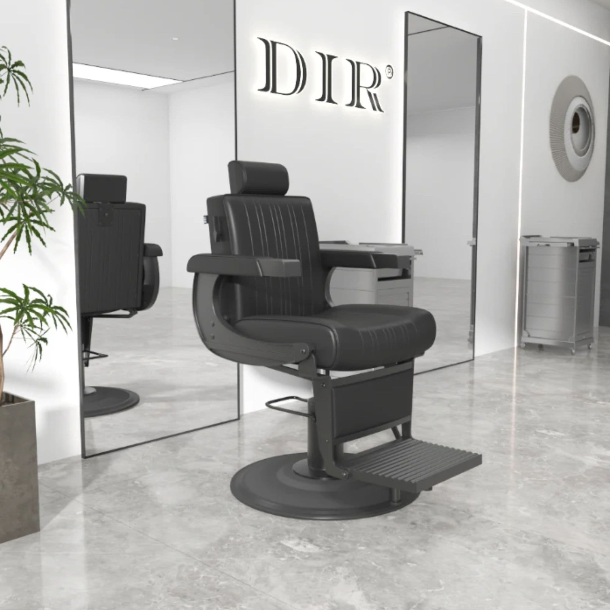 DIR Belgrano Classic Barber Chair Black Variant Front Angled View With Two Tall Mirror A Potted Plant And A Brand Name In The Background