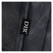 DIR Belgrano Classic Barber Chair Close-Up View Of Vintage Black Upholstery With Horizontal Stitching And Brand Name