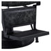 DIR Belgrano Classic Barber Chair Vintage Black Variant With Close-Up View Of Footrest Platform On White Background
