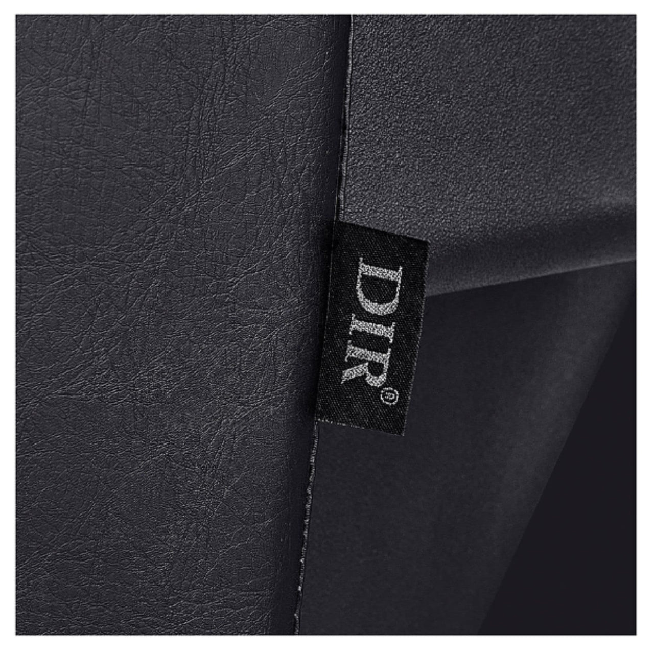 DIR Bella V Recline Massage Shampoo Station Close-Up View Of Black Upholstery With Name