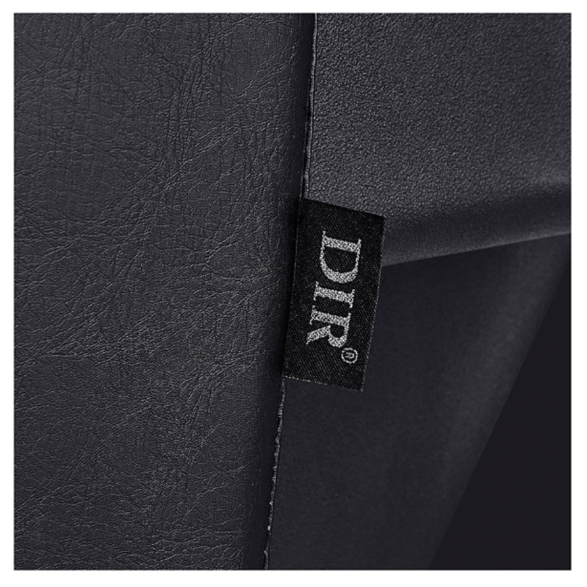 DIR Bella V Recline Massage Shampoo Station Close-Up View Of Black Upholstery With Name
