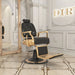 DIR Cavalier Golden Barber Chair Black Variant Front Angled View With Tall Mirror And Brand Name In The Background
