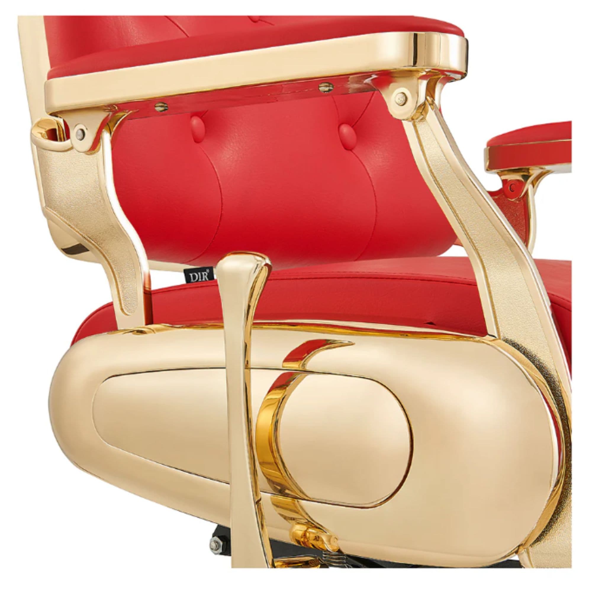 DIR Cavalier Golden Barber Chair Close-Up View Of Decorative Metallic Gold Armrest Support And Red Upholstered Seat