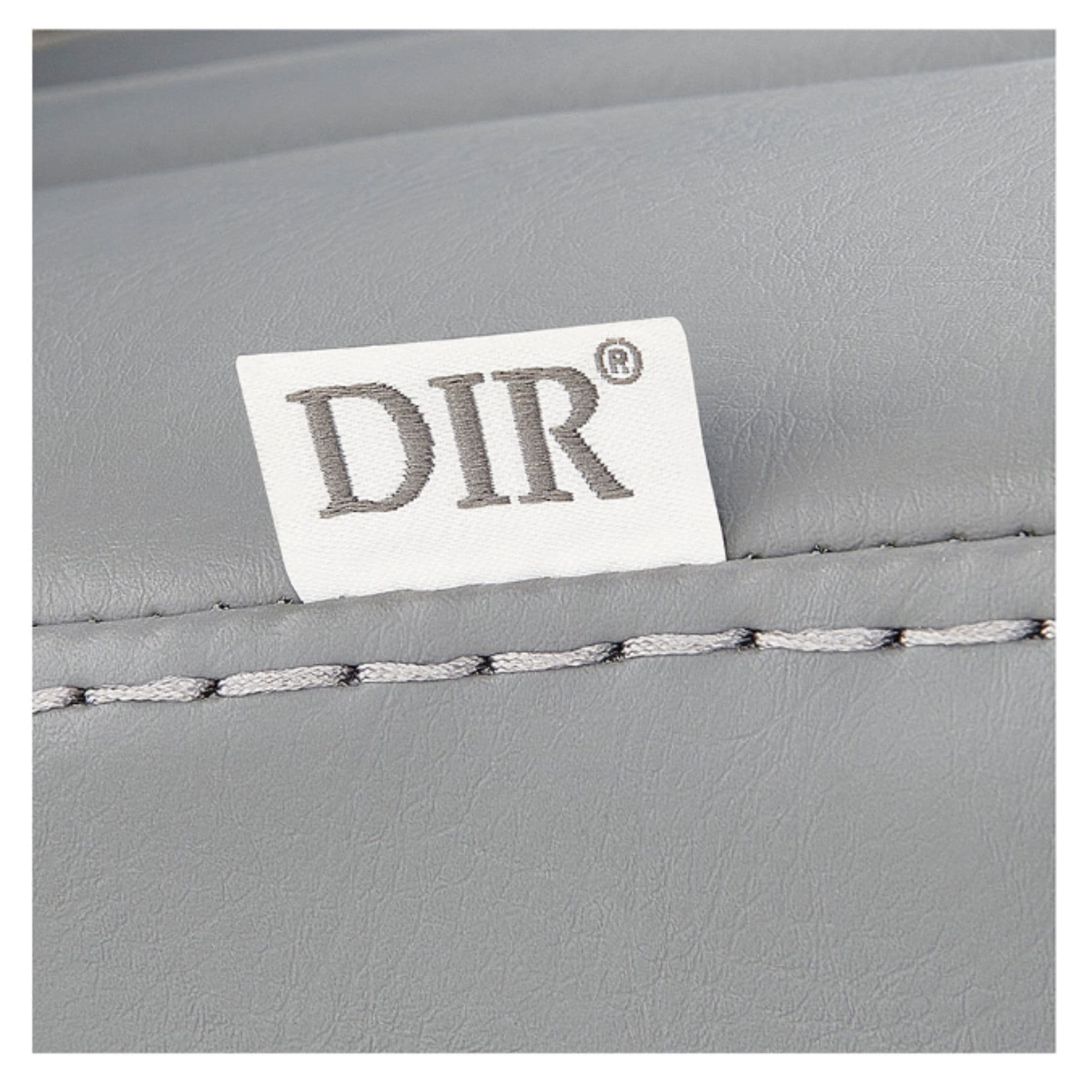 DIR Esquire Reclining Barber Chairs Close-Up View Of Gray Upholstery With Horizontal Stitching And Brand Name