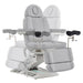 DIR Geneva 4-Motors Exam Table with Stirrups - OB GYN Gray Front View With Swivel Rotation Demonstration On White Background