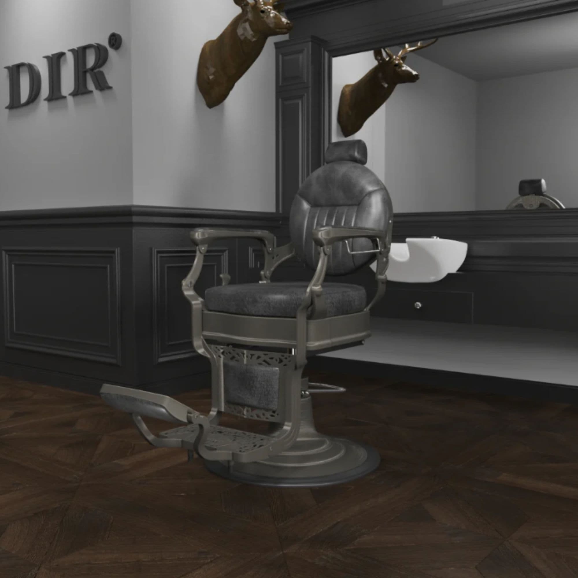DIR Kaiser Retro Style Vintage Barber Chair Black Variant Front Angled View With Mirror A Brand Name And A Deer Head Sculpture In The Background