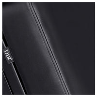 Thumbnail for DIR Luxi 4-Motors Medical Spa Treatment Bed Close-Up View Of Black Upholstery With Brand Name And Stitching On White Background