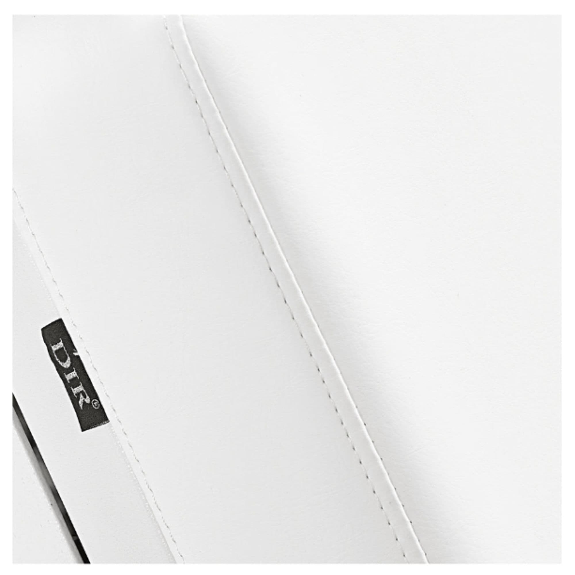 DIR Luxi 4-Motors Medical Spa Treatment Bed Close-Up View Of White Upholstery With Brand Name And Stitching On White Background