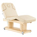 DIR Luxi 4-Motors Medical Spa Treatment Bed Front Angled View Of Beige Color With Semi-Folded Leg Section And Remote Control On White Background