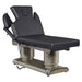 DIR Luxi 4-Motors Medical Spa Treatment Bed Front Angled View Of Black Color With Adjustable Side Cushions On White Background