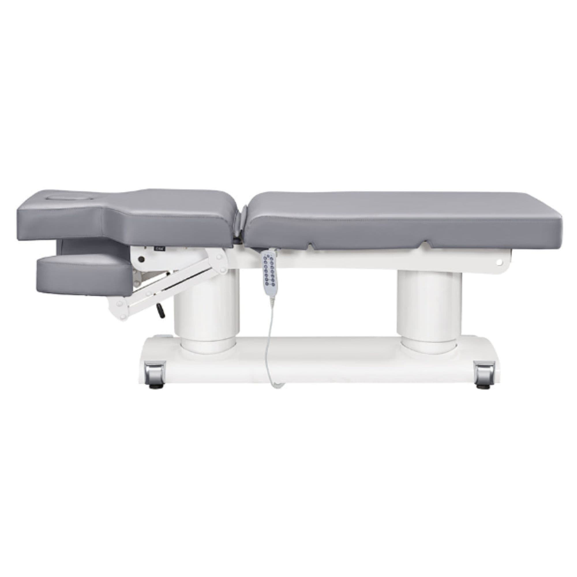 DIR Luxi 4-Motors Medical Spa Treatment Bed Side View And Fully Reclined Of Gray Color With Slightly Adjusted Side Cushion And Remote Control On White Background