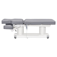 Thumbnail for DIR Luxi 4-Motors Medical Spa Treatment Bed Side View And Fully Reclined Of Gray Color With Slightly Adjusted Side Cushion And Remote Control On White Background