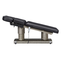 Thumbnail for DIR Luxi 4-Motors Medical Spa Treatment Bed Side View Of Black Color Fully Reclined Chair And Raised Head Section With Remote Control On White Background