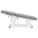 DIR Luxi 4-Motors Medical Spa Treatment Bed Side View Of Gray Color Fully Reclined Chair And Raised Head Section With Remote Control On White Background