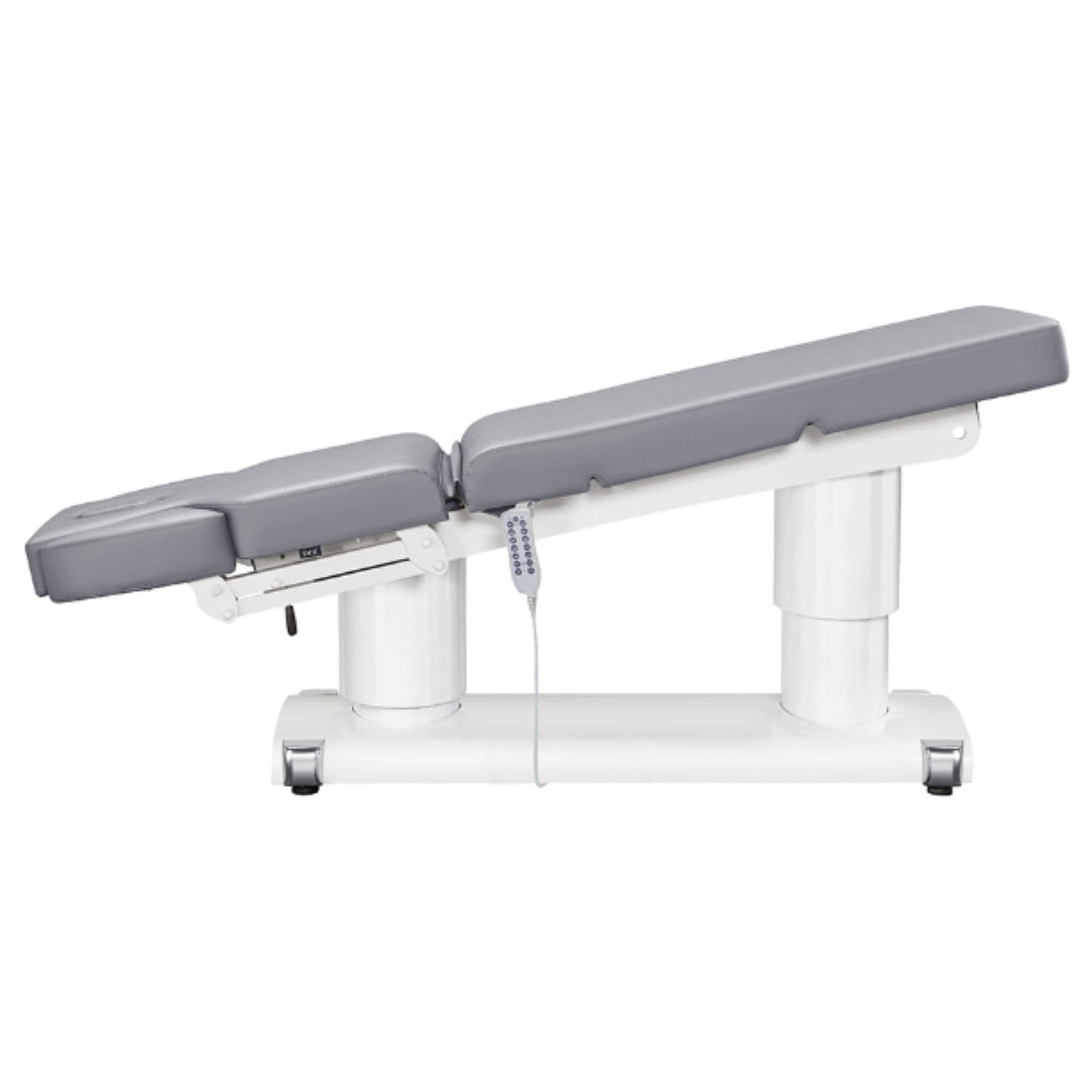 DIR Luxi 4-Motors Medical Spa Treatment Bed Side View Of Gray Color Fully Reclined Chair With Raised Leg Section And Remote Control On White Background