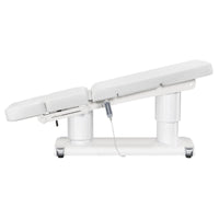 Thumbnail for DIR Luxi 4-Motors Medical Spa Treatment Bed Side View Of White Color Fully Reclined Chair With Raised Leg Section And Remote Control On White Background