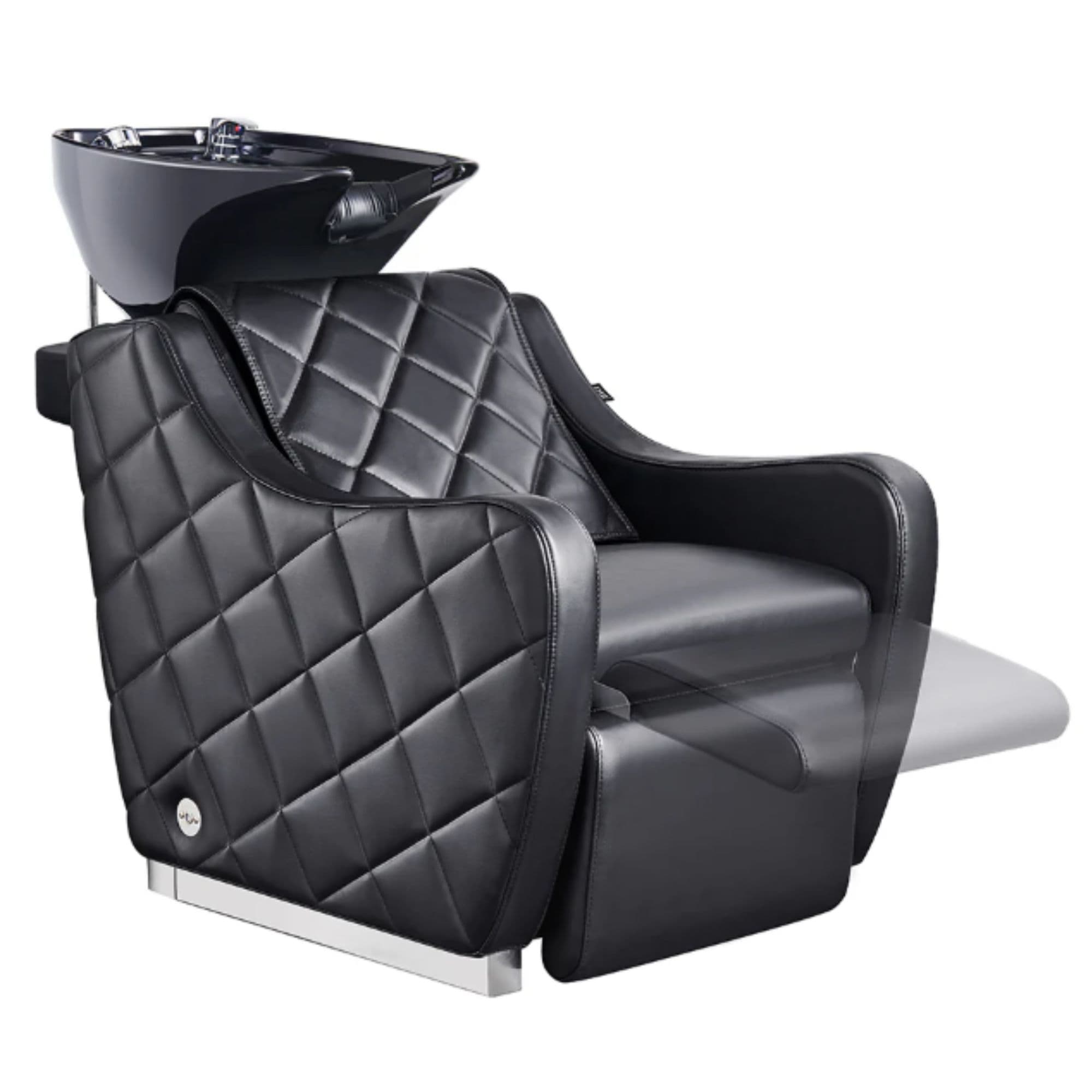 DIR Minervah Massage Backwash Unit Black Front Angled View Of Black Single Shampoo Wash Station With Blurred Leg Rest Demonstration