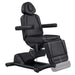 DIR Pavo 4-Motor Swivel Spa Treatment Bed Black Variant Front Angled View Demonstrating Leg Rest Extension Range On White Background