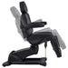 DIR Pavo 4-Motors Swivel Medical Spa Treatment Table Black Variant Side View Demonstrating Swing Adjustment On White Background