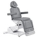 DIR Pavo 4-Motors Swivel Medical Spa Treatment Table Gray Variant Front Angled View Demonstrating Leg Rest Extension Range On White Background
