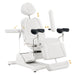 DIR Pavo OB 4-Motors OB GYN Exam Chair with Stirrups White Front Angled View Demonstrating Adjustable Chair Features On White Background