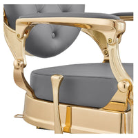 Thumbnail for DIR Princeton Gold Finish Barbershop Chair Close-Up View Of Decorative Armrest Support And Gray Upholstered Seat