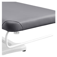Thumbnail for DIR Serenity Electric Treatment Table Close-Up View Of Paper Towel Holder And Gray Upholstery