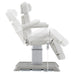 DIR Sydney 4-Motors Esthetician Chair White Side View Demonstrating Chair And Stirrup Adjustment Positions On White Background