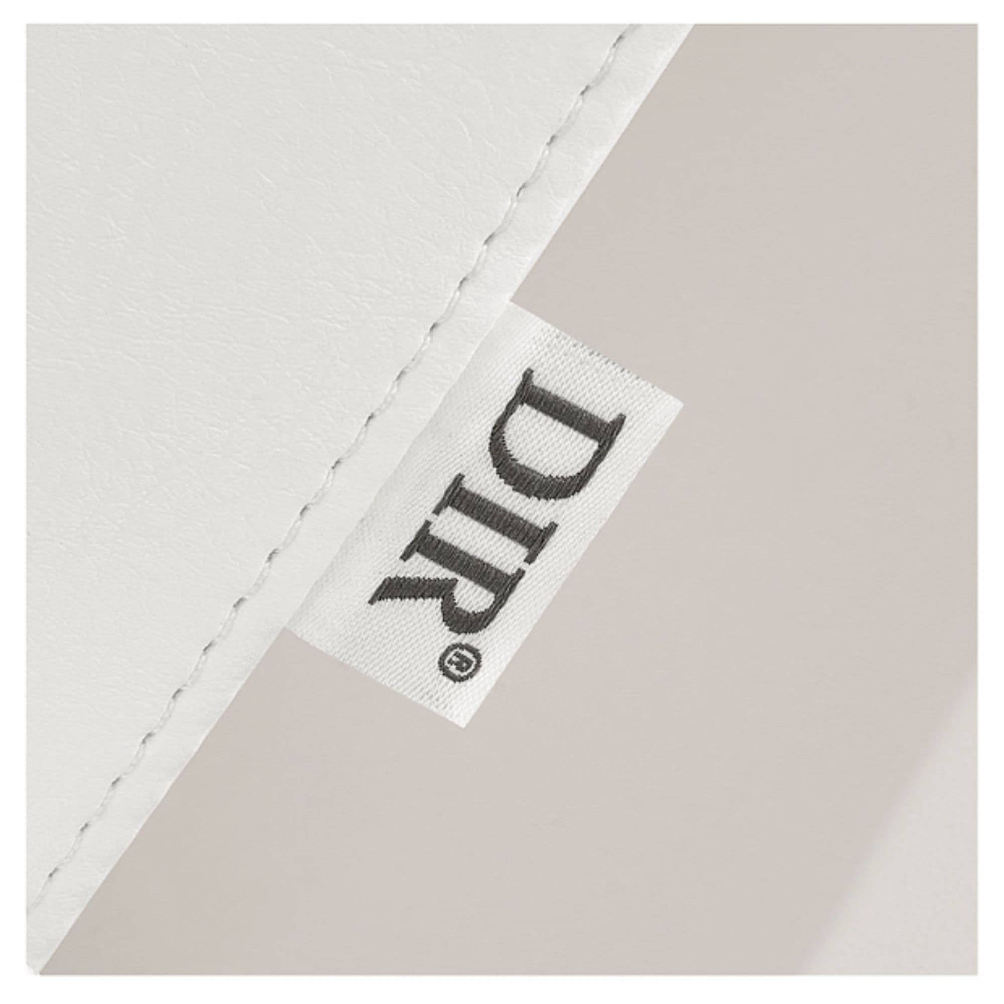 DIR Takaran Adjustable Shampoo Backwash Unit Close-Up View Of White Material With Brand Name