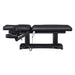 DIR Tranquility 4-Motors Electric Medical Spa Treatment Table Side View And Fully Reclined Of Black Variant With Slightly Adjusted Side Cushion And Remote Control On White Background