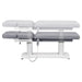 DIR Tranquility 4-Motors Electric Medical Spa Treatment Table Side View And Fully Reclined Of Gray Variant Showing An Up And Down Adjustment With Remote Control On White Background