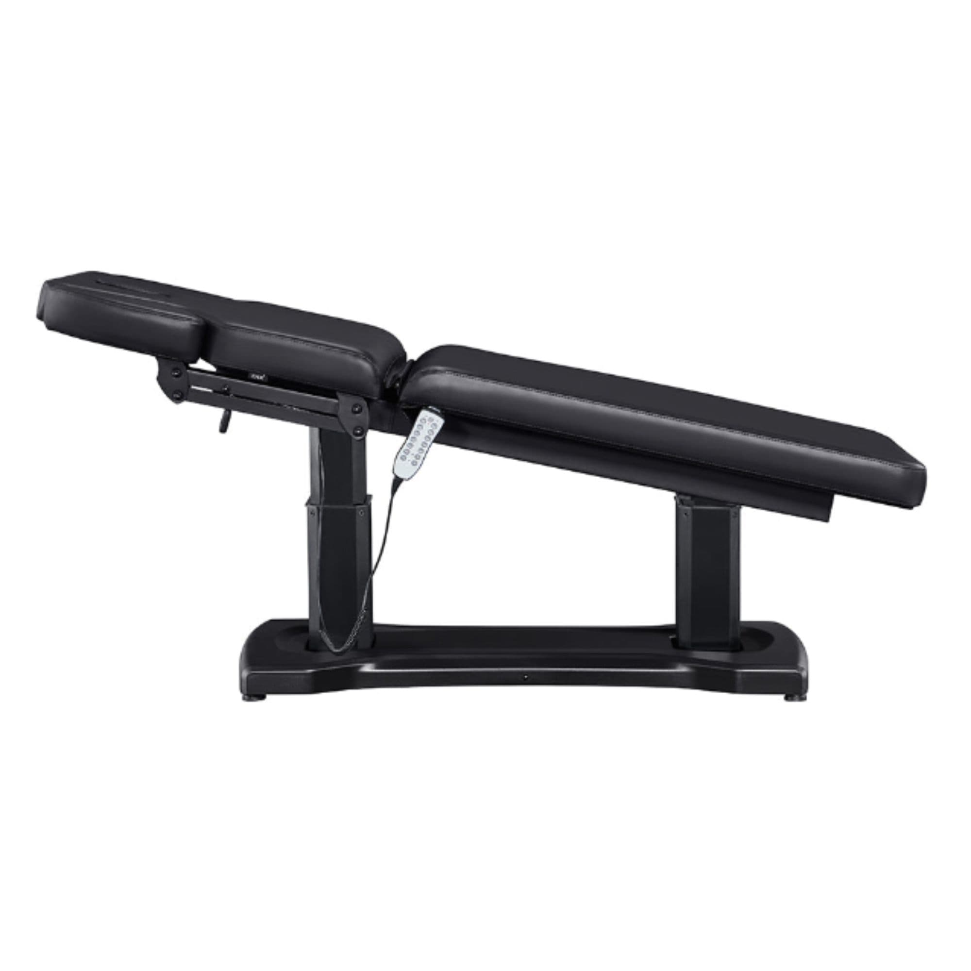 DIR Tranquility 4-Motors Electric Medical Spa Treatment Table Side View Of Black Variant Fully Reclined Chair And Raised Head Section With Remote Control On White Background