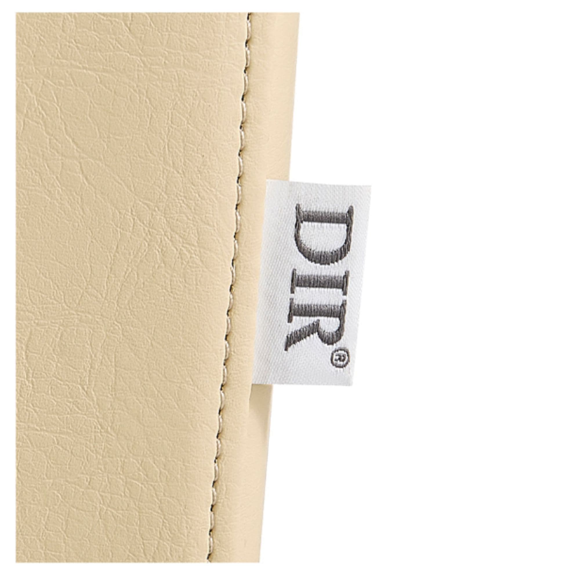 DIR Victoria Electric Shampoo Backwash Unit Close-Up View Of Vertical Stitched Beige Upholstery With Brand Name