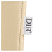 DIR Victoria Electric Shampoo Backwash Unit Close-Up View Of Vertical Stitched Beige Upholstery With Brand Name