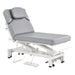 DIR VitalEarth 2-Motors Treatment Table and Wellness Therapy Bed Gray Color Front Angled View With Face Cradle And Foot Controls On White Background
