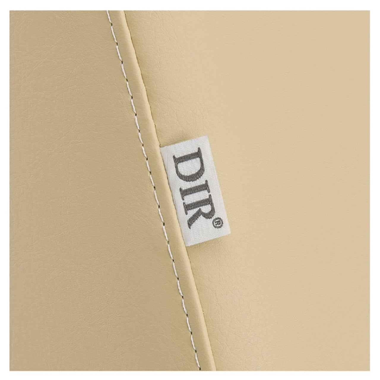 DIR WellRelax 2-Motors Therapy Treatment Table Close-Up View Of Beige Upholstery With Brand Name