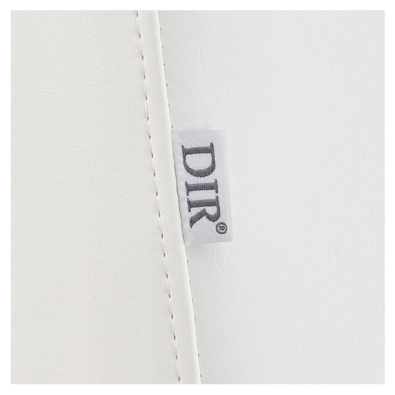 DIR WellRelax 2-Motors Therapy Treatment Table Close-Up View Of White Upholstery With Brand Name