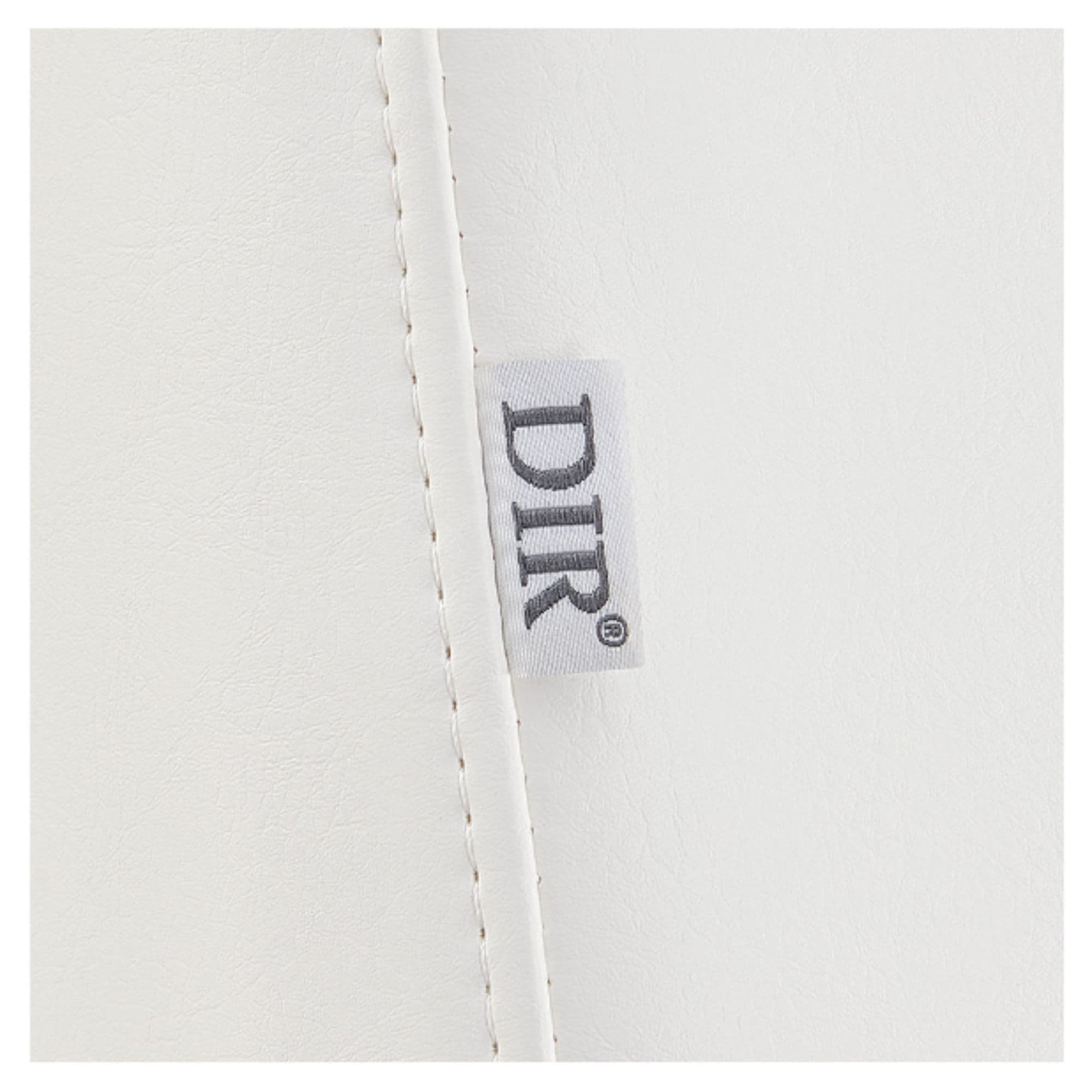 DIR WellRelax 2-Motors Therapy Treatment Table Close-Up View Of White Upholstery With Brand Name