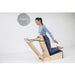 Elina Baby Chair With A Woman Performing A Kneeling Pilates Arm Exercise And Brand Name In The Background