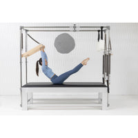 Thumbnail for Elina Classic Aluminium Cadillac Trapeze Side View With A Women Performing A Pilates Exercise And Brand Name In The Background