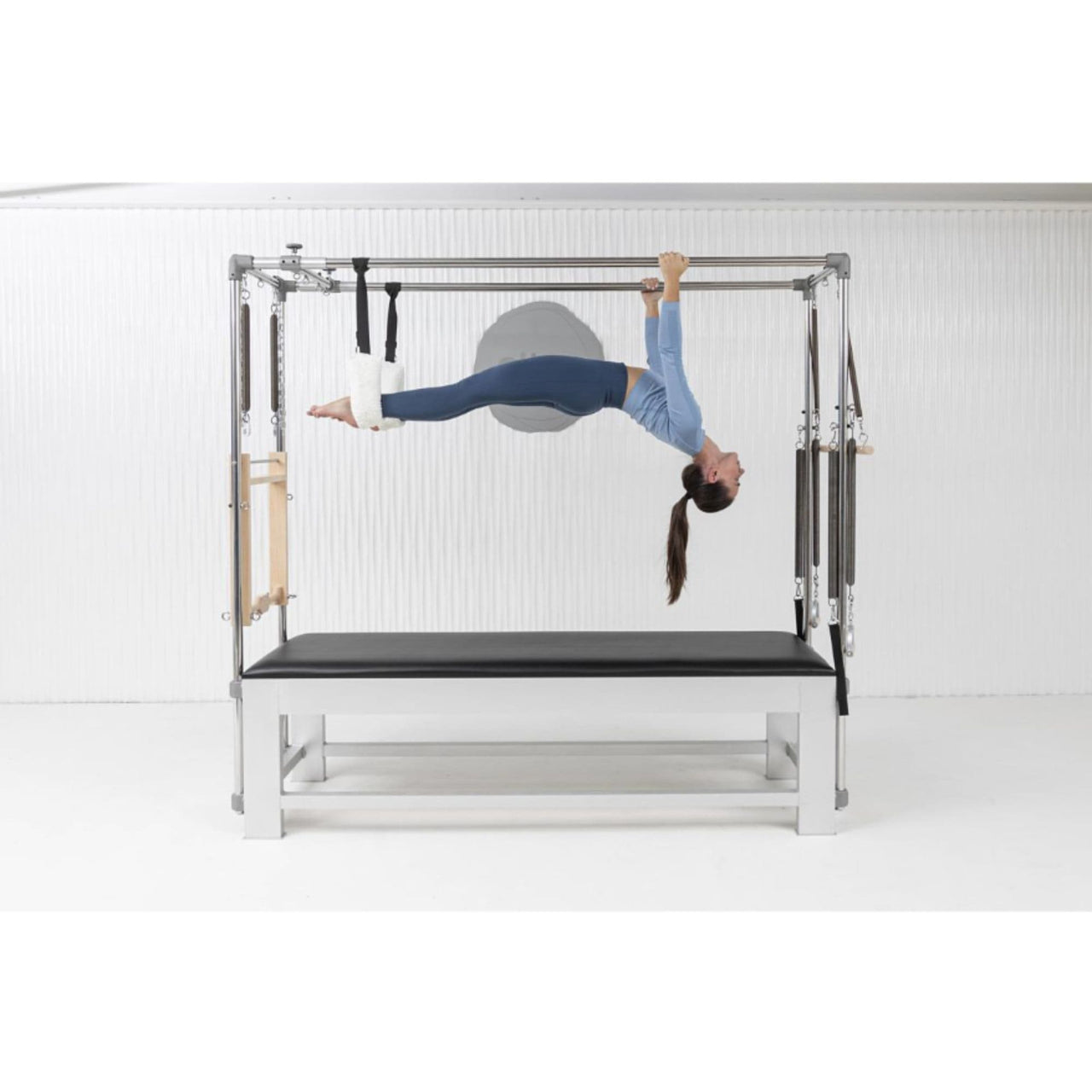 Elina Classic Aluminium Cadillac Trapeze With A Women Performing A Hanging Exercise